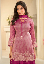 Load image into Gallery viewer, Woman wearing a pink embroidered dress in an indoor setting
