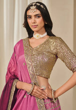 Load image into Gallery viewer, Fashneo pink and gold lehenga choli with intricate gold embroidery and matching accessories