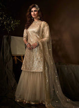 Load image into Gallery viewer, Dusky Beige Sequins Work Embroidered Gharara Style Suit fashionandstylish.myshopify.com