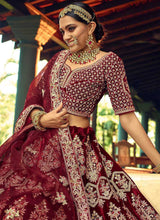Load image into Gallery viewer, Maroon And Gold Heavy Embroidered Velvet Lehenga fashionandstylish.myshopify.com