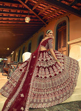 Load image into Gallery viewer, Maroon And Gold Heavy Embroidered Velvet Lehenga fashionandstylish.myshopify.com