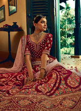 Load image into Gallery viewer, Maroon And Gold Heavy Embroidered Velvet Lehenga Choli fashionandstylish.myshopify.com