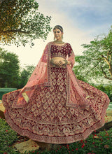 Load image into Gallery viewer, Maroon And Gold Heavy Embroidered Velvet Lehenga Suit fashionandstylish.myshopify.com