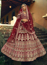 Load image into Gallery viewer, Maroon And Gold Heavy Embroidered Velvet Lehenga fashionandstylish.myshopify.com
