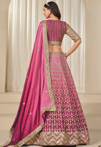 Fashneo pink and gold lehenga choli with intricate embroidery and matching dupatta for festive occasions