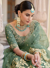 Load image into Gallery viewer, Green Heavy Floral Embroidered Stylish Wedding Lehenga fashionandstylish.myshopify.com
