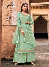 Load image into Gallery viewer, Green and Gold Heavy Embroidered Designer Palazzo Style Suit fashionandstylish.myshopify.com
