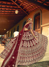 Load image into Gallery viewer, Maroon And Gold Heavy Embroidered Velvet Lehenga fashionandstylish.myshopify.com
