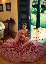 Load image into Gallery viewer, Maroon And Gold Heavy Embroidered Velvet Lehenga Choli fashionandstylish.myshopify.com
