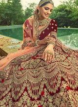 Load image into Gallery viewer, Maroon And Gold Heavy Embroidered Velvet Lehenga Outfit fashionandstylish.myshopify.com
