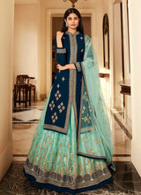 Load image into Gallery viewer, Teal Blue and Aqua Heavy Embroidered Jacket Style Lehenga fashionandstylish.myshopify.com
