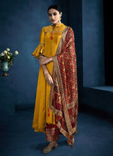 Load image into Gallery viewer, Yellow and Red Kalidar Embroidered Plazzo Style Suit fashionandstylish.myshopify.com
